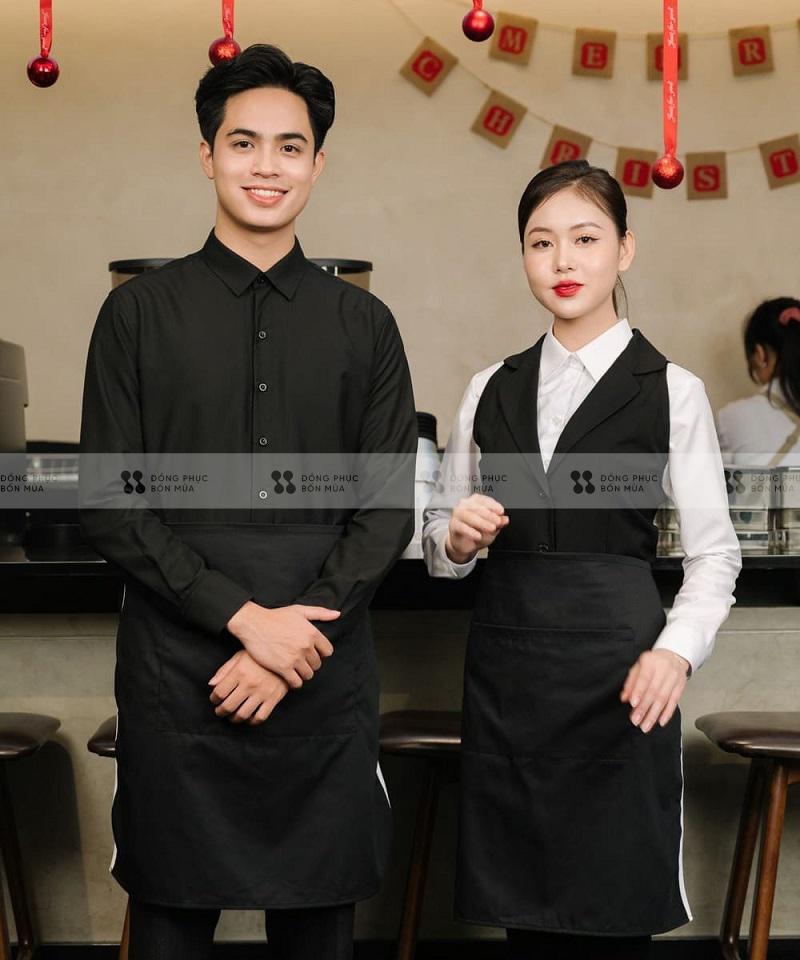 Đồng phục nhà hàng màu đen sang trọng tại Đồng Phục Bốn Mùa được làm từ chất liệu vải cao cấp